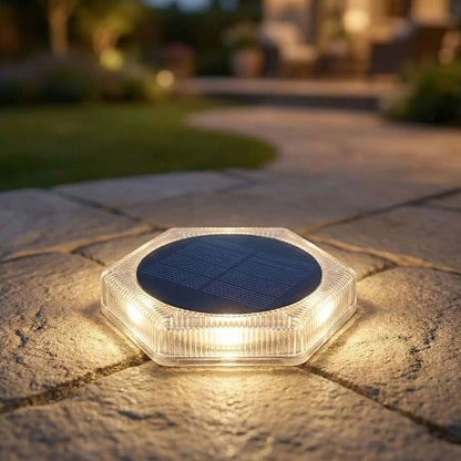 Eclairage sol exterieur solaire blanc chaud autonome installé sur terrasse étanche IP68