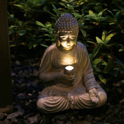 Bouddha lampe solaire extérieur en position méditative avec lumière LED chaleureuse
